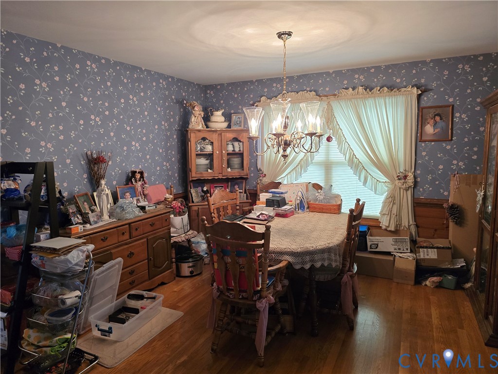 701 Whitestone Place Colonial Heights, VA 23834 - Photo 12 of 25 a view of a dining room with furniture and chandelier