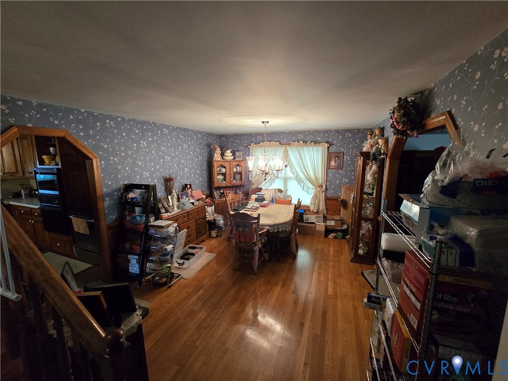 701 Whitestone Place Colonial Heights, VA 23834 - Photo 13 of 25 a living room with lots of furniture and gym equipment