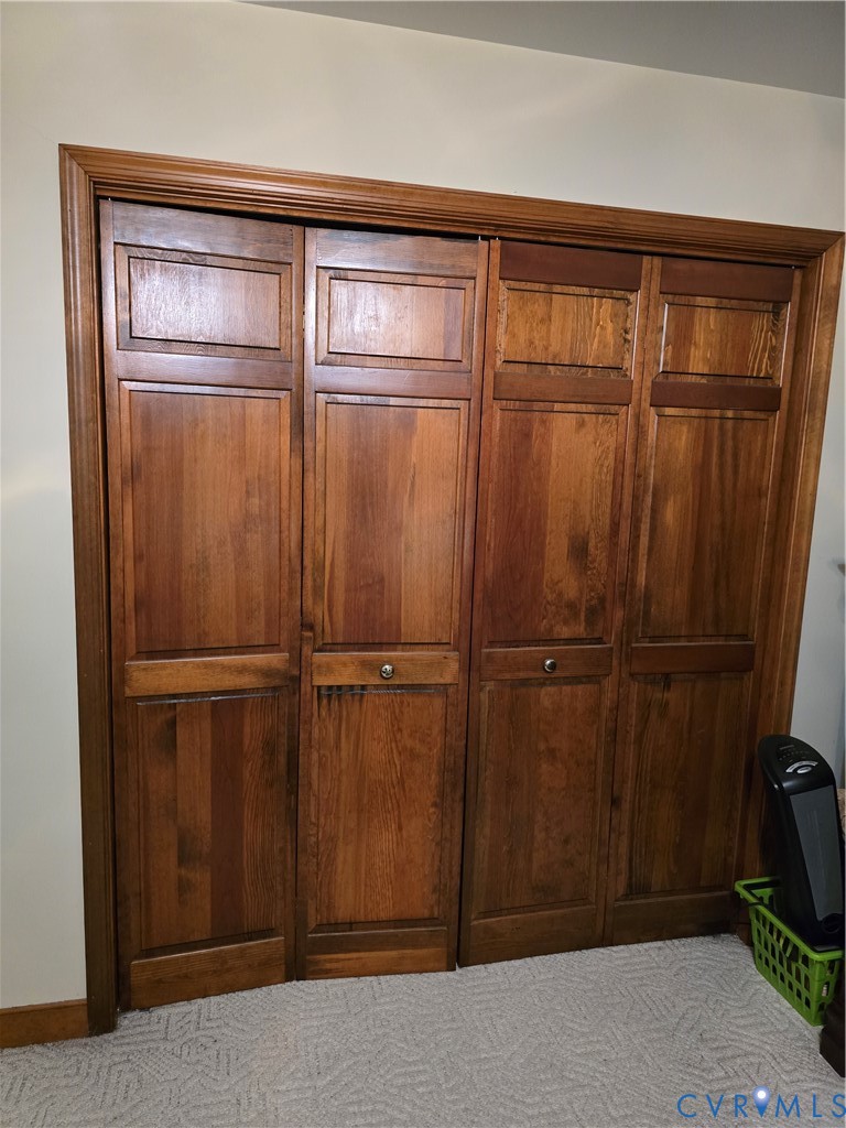 701 Whitestone Place Colonial Heights, VA 23834 - Photo 17 of 25 a view of a room with an empty walk in closet