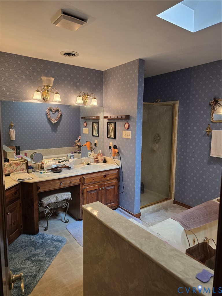 701 Whitestone Place Colonial Heights, VA 23834 - Photo 22 of 25 a view of kitchen island with granite countertop furniture and a fireplace