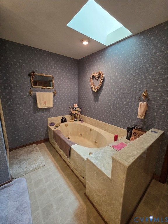701 Whitestone Place Colonial Heights, VA 23834 - Photo 23 of 25 a bathroom with a tub and a mirror
