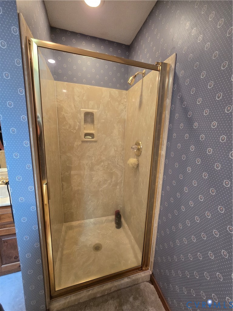 701 Whitestone Place Colonial Heights, VA 23834 - Photo 24 of 25 a bathroom with a glass door shower