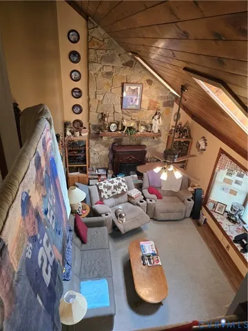 a view of store room with furniture and rug