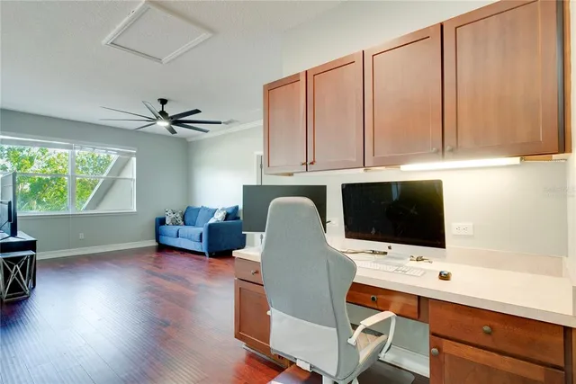 a room with furniture and a flat screen tv
