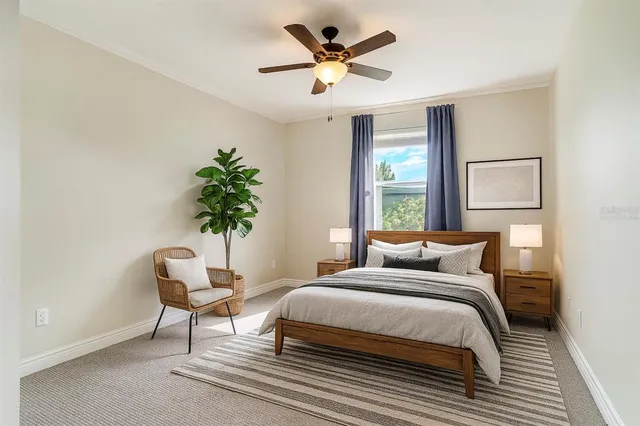 a bedroom with a bed and a chair