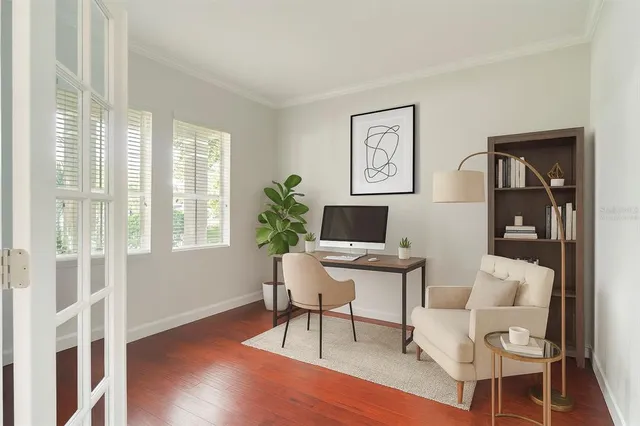 a workspace with furniture and a window
