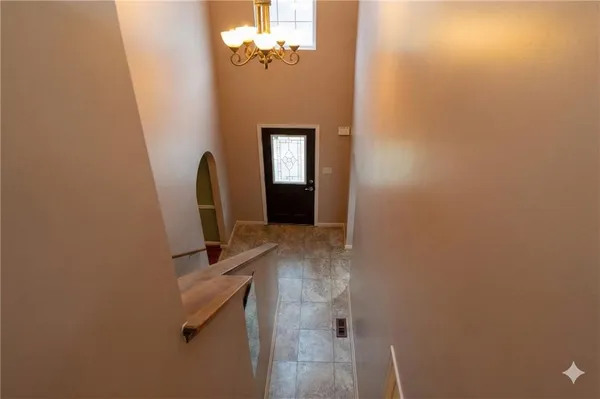 a view of a bathroom with a sink and mirror