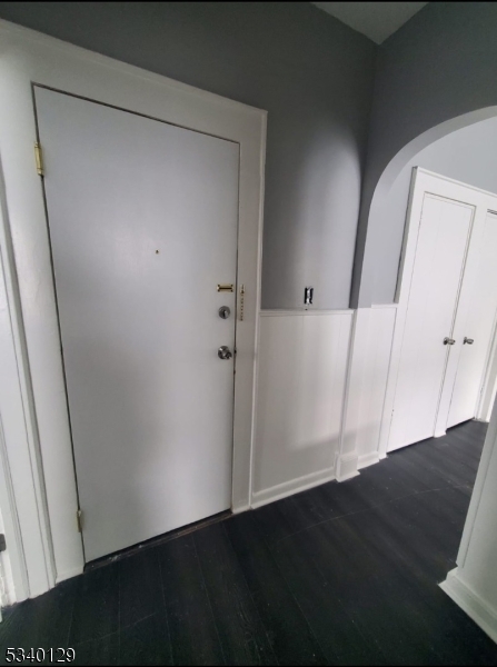 127 Sunset Avenue, Unit 1 Newark, NJ 07106 - Photo 4 of 12 an empty room with wooden floor