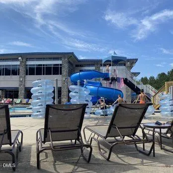 a view of a swimming pool with a fountain