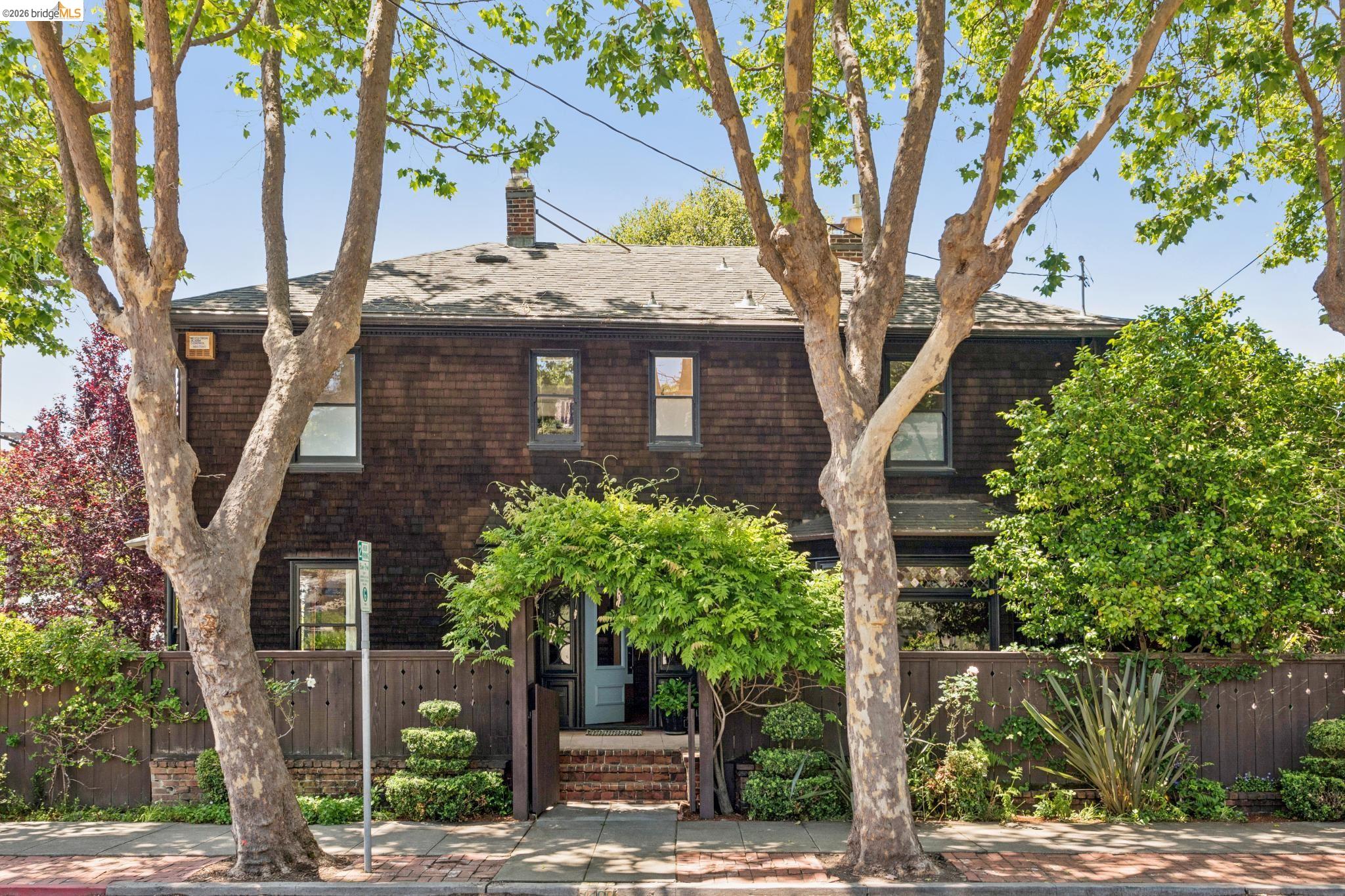 1490 Arch Street Berkeley, CA 94708 - Photo 1 of 57 front view of a house with a tree
