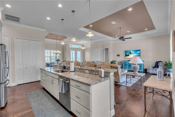 a view of a living room and dining room