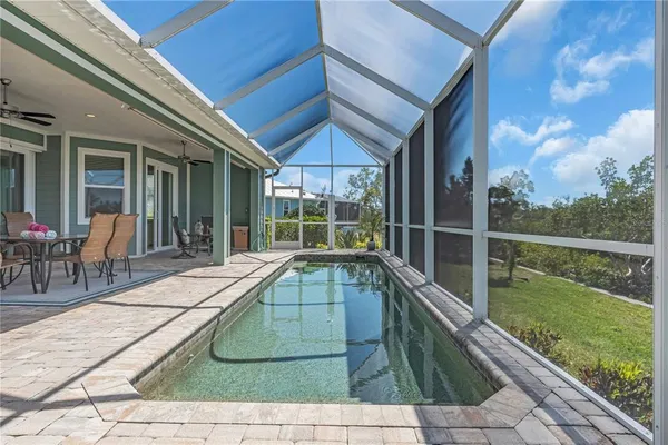 a view of a house with a swimming pool