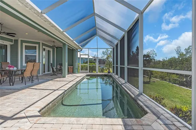 a view of a house with a swimming pool