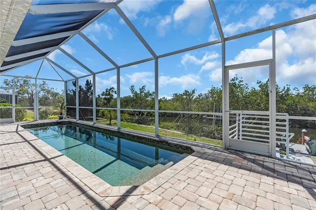 a view of outdoor space with swimming pool