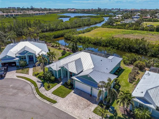 an aerial view of a house with garden space and outdoor space