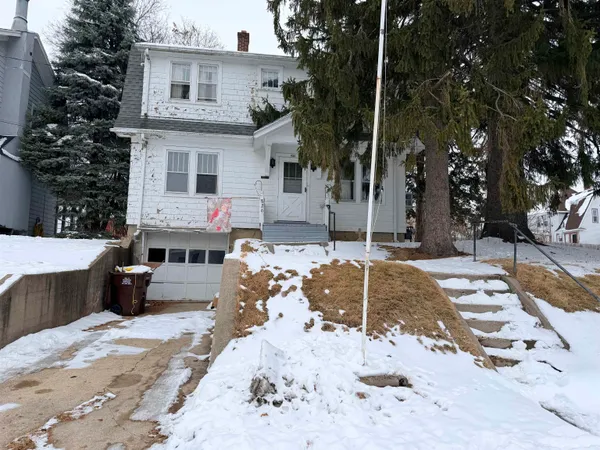 a view of a backyard of the house
