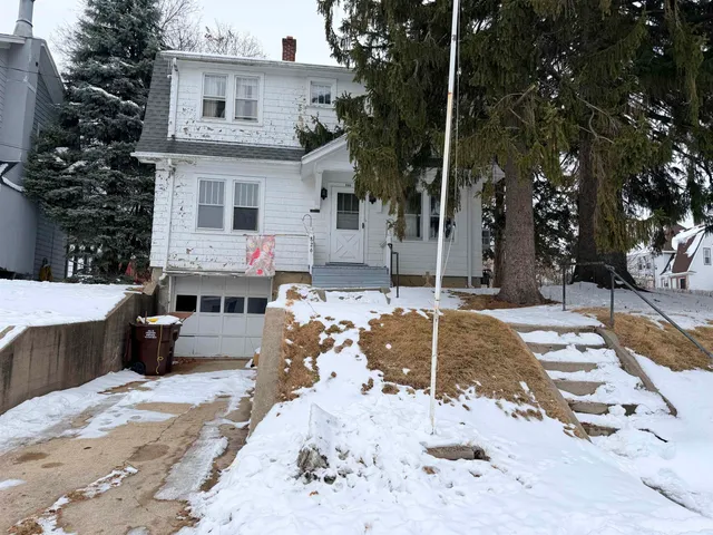 a view of a backyard of the house