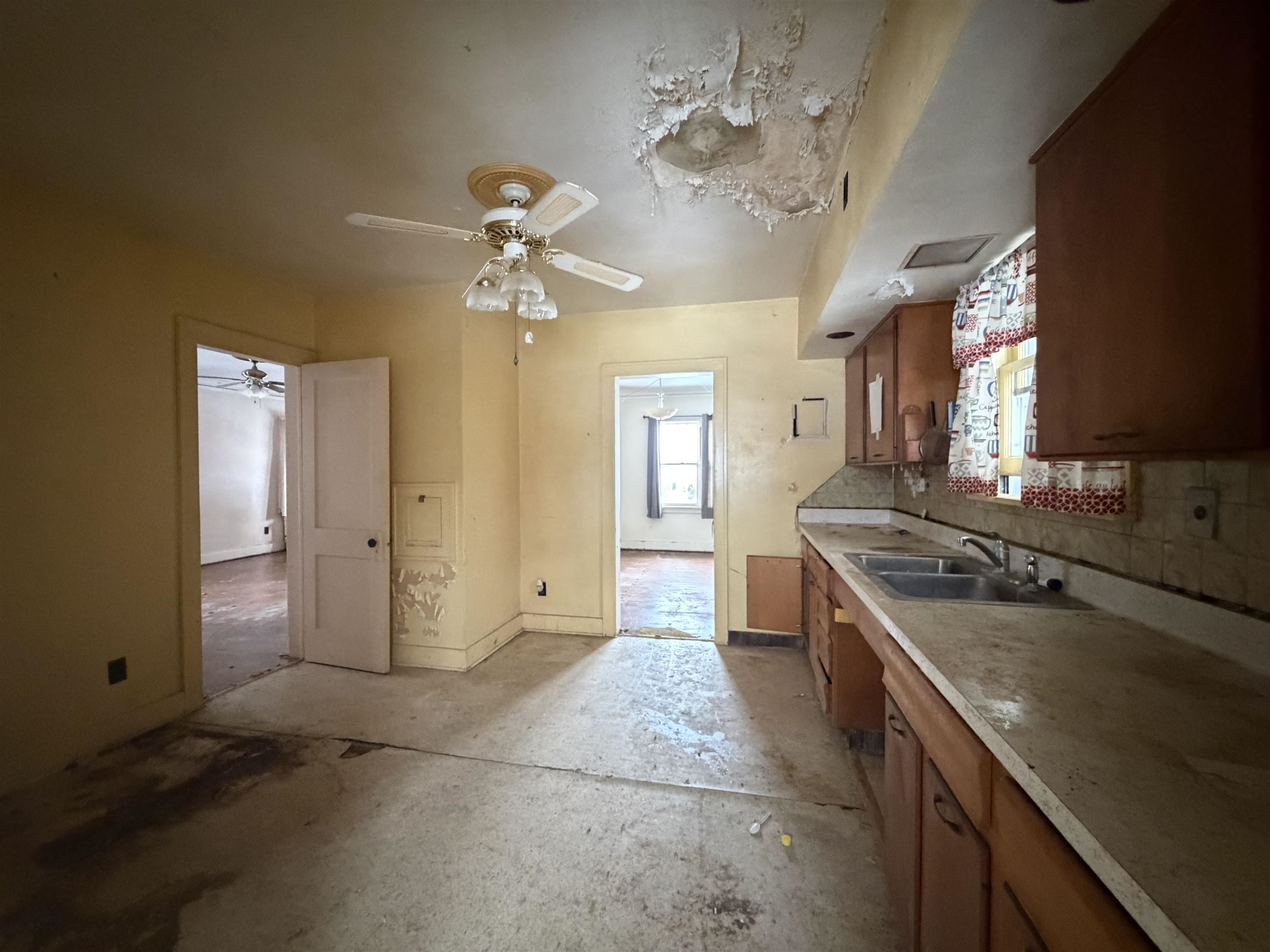 826 West Chestnut Street Freeport, IL 61032 - Photo 14 of 30 a kitchen with a stove and a refrigerator