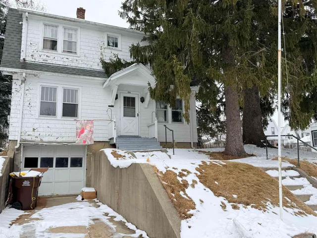 a view of a house with a patio