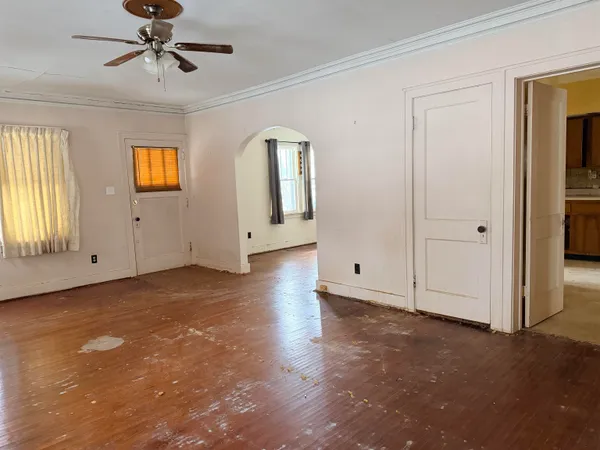 a view of an empty room with a window