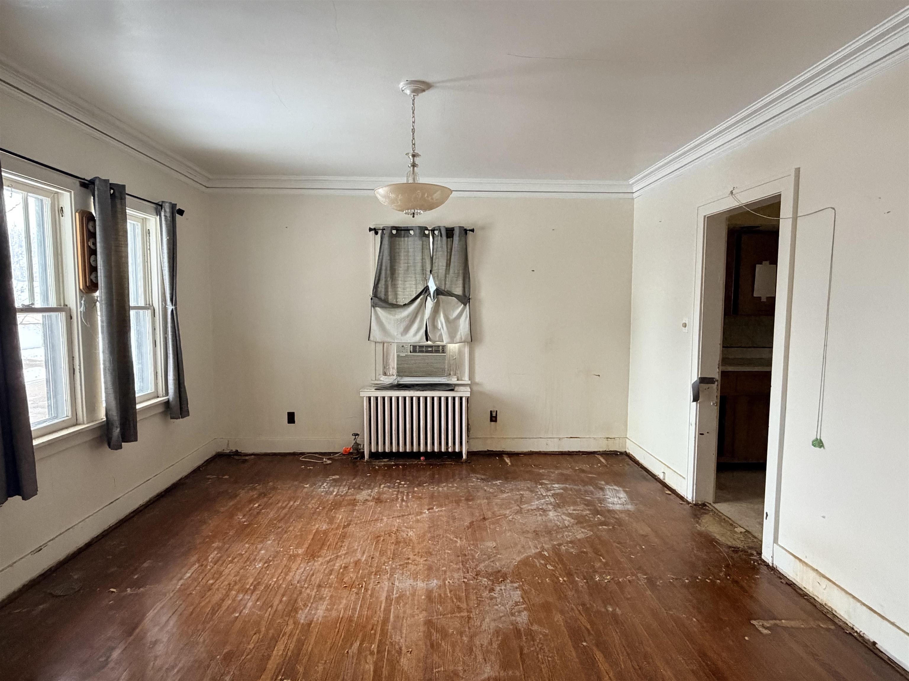 826 West Chestnut Street Freeport, IL 61032 - Photo 9 of 30 a view of room with window and hardwood floor