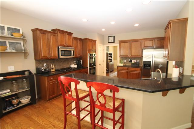 5532 Rathkeale Lane Franklin, TN 37067 - Photo 6 of 20 ALSO FEATURES GRANITE TOPS ~ STAINLESS STEEL APPLIANCES ~ DOUBLE OVENS ~ GAS COOKTOP