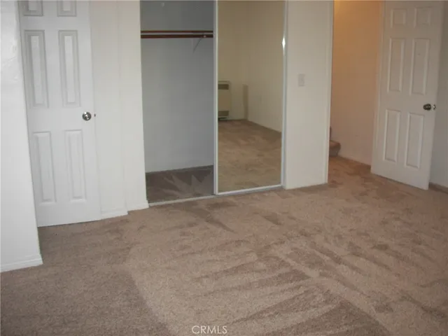 a view of a tree in a yard