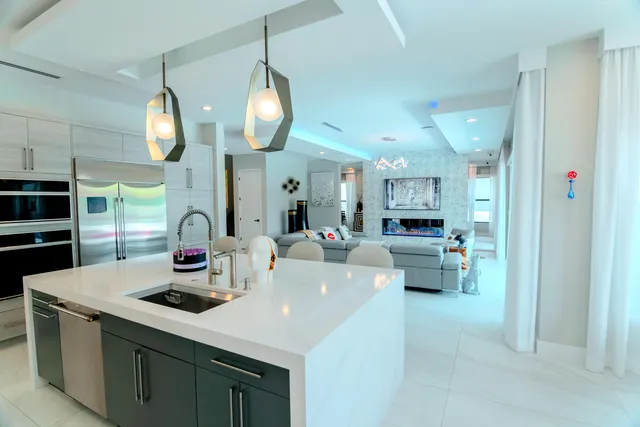 a picture of a couch in a living room with a fireplace