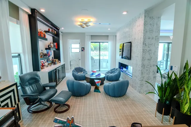 a painting on a wall next to a window