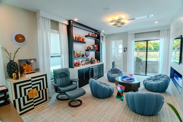 a view of a hallway with seating area