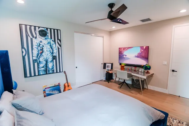 a bathroom with a double vanity sink tub mirror and double