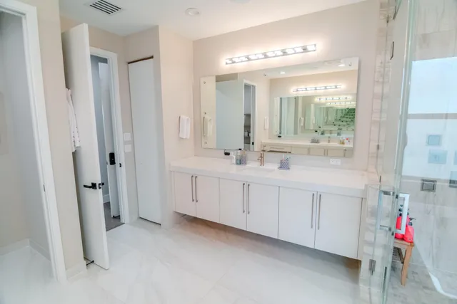 a living room with furniture a rug and a fireplace