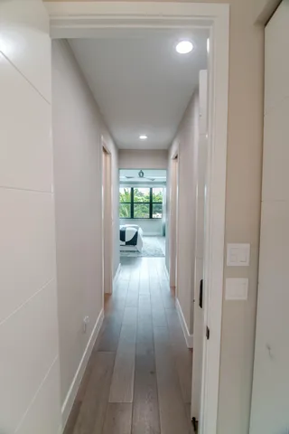 a view of lawn chairs and table in front of house