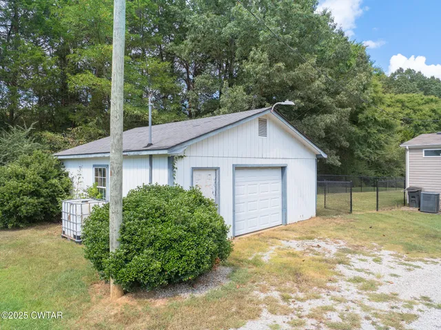 a view of a lake with a yard
