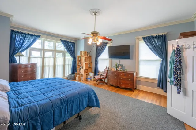 a bathroom with a sink shower and a mirror