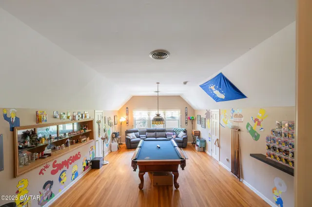 a bedroom with bed and a closet