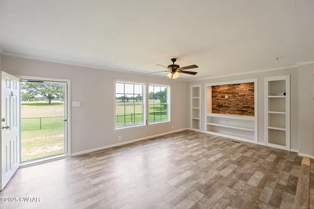 an empty room with windows