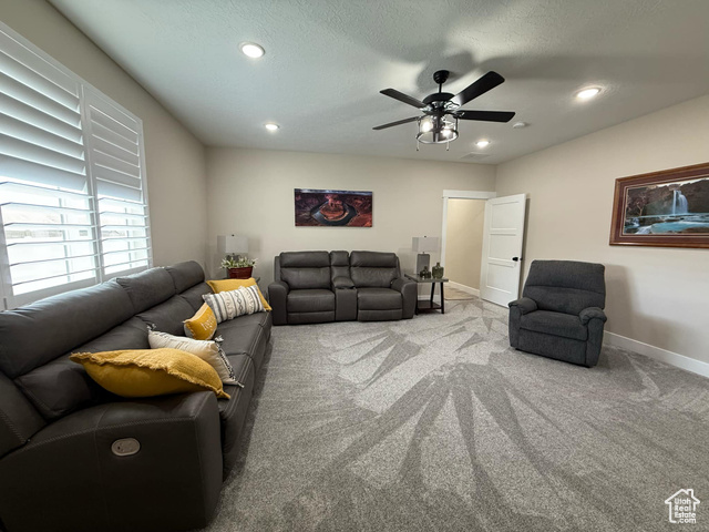 1240 West 2360 North Helper, UT 84526 - Photo 51 of 79 Living room with baseboards, carpet floors, ceiling fan, and recessed lighting