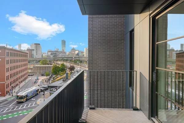 a balcony with a city view