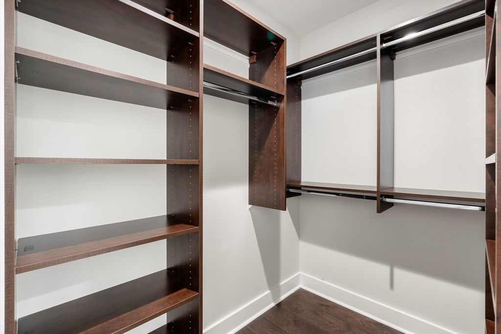 14 West Broadway, Unit 507 Boston, MA 02127 - Photo 9 of 18 a view of walk in closet with empty racks
