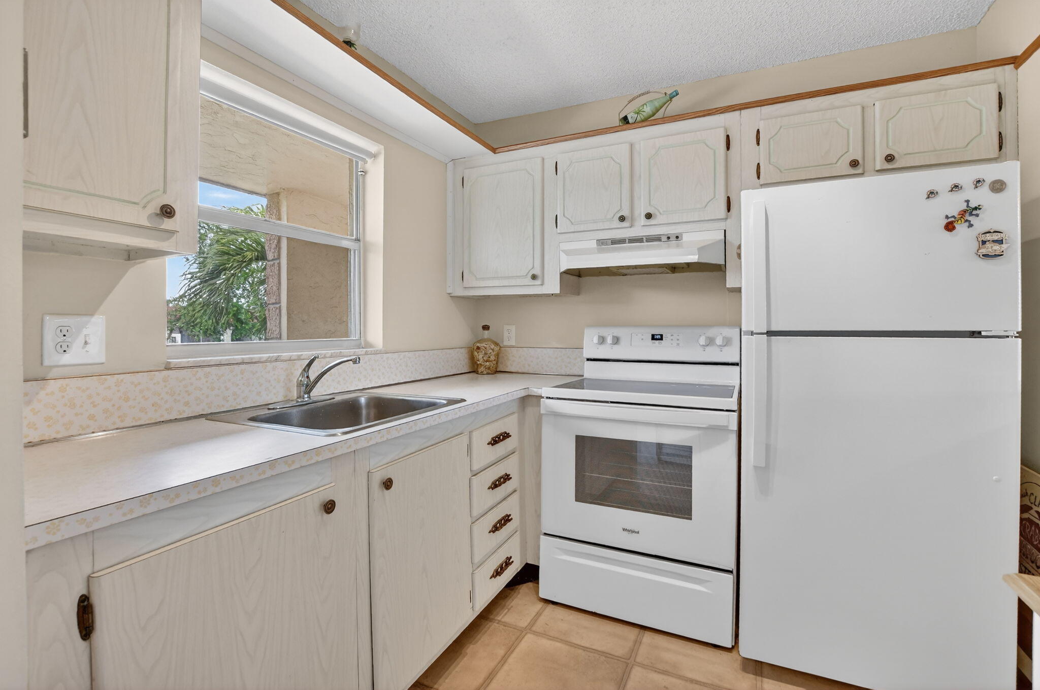 9855 Sandalfoot Boulevard, Unit 317 Boca Raton, FL 33428 - Photo 11 of 29 11-web-or-mls-DSC_4693