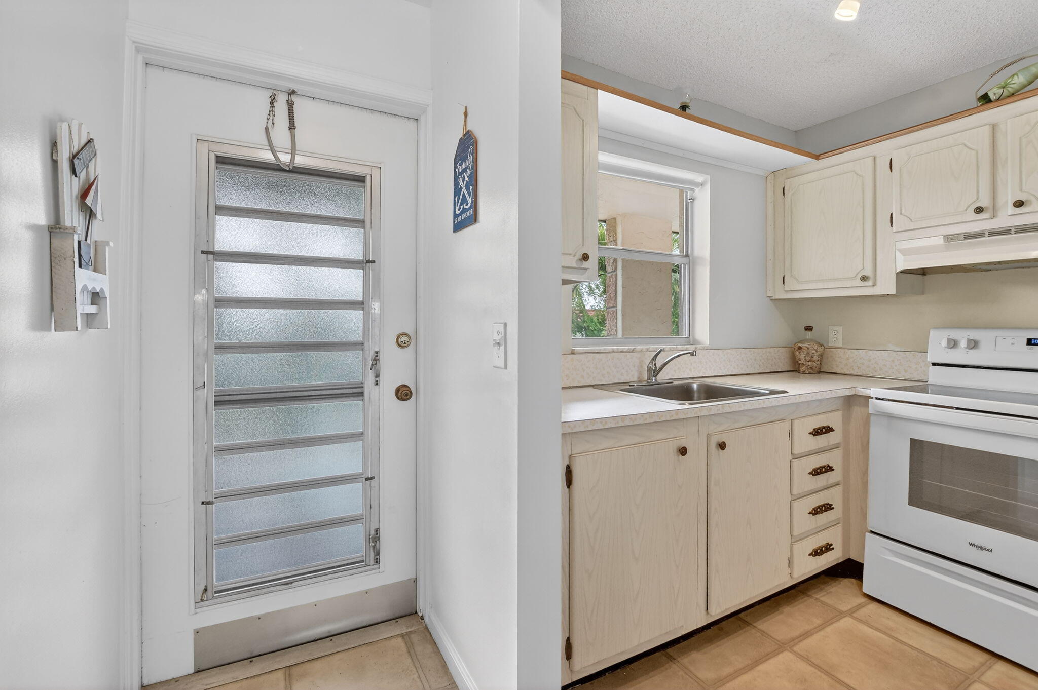9855 Sandalfoot Boulevard, Unit 317 Boca Raton, FL 33428 - Photo 4 of 29 4-web-or-mls-DSC_4689