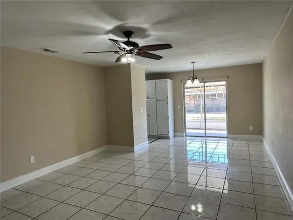 a view of an empty room and window
