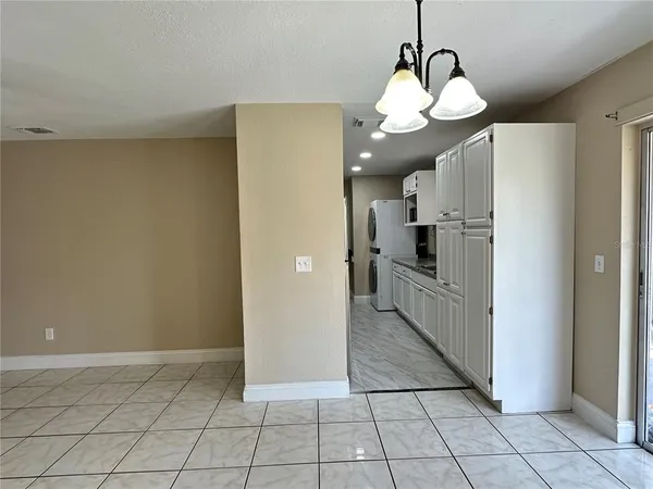 a view of a kitchen with kitchen