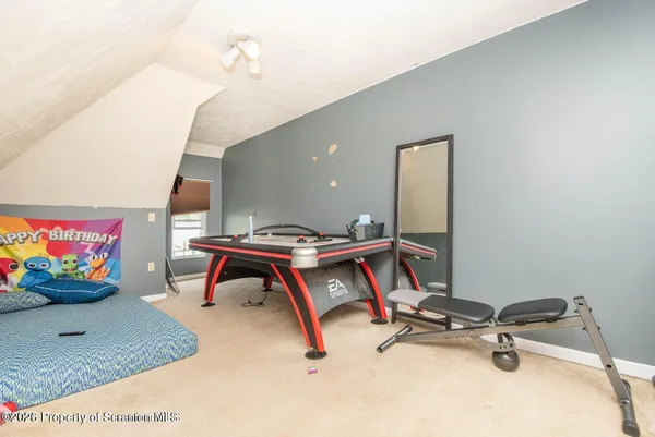 a room with furniture and a chandelier