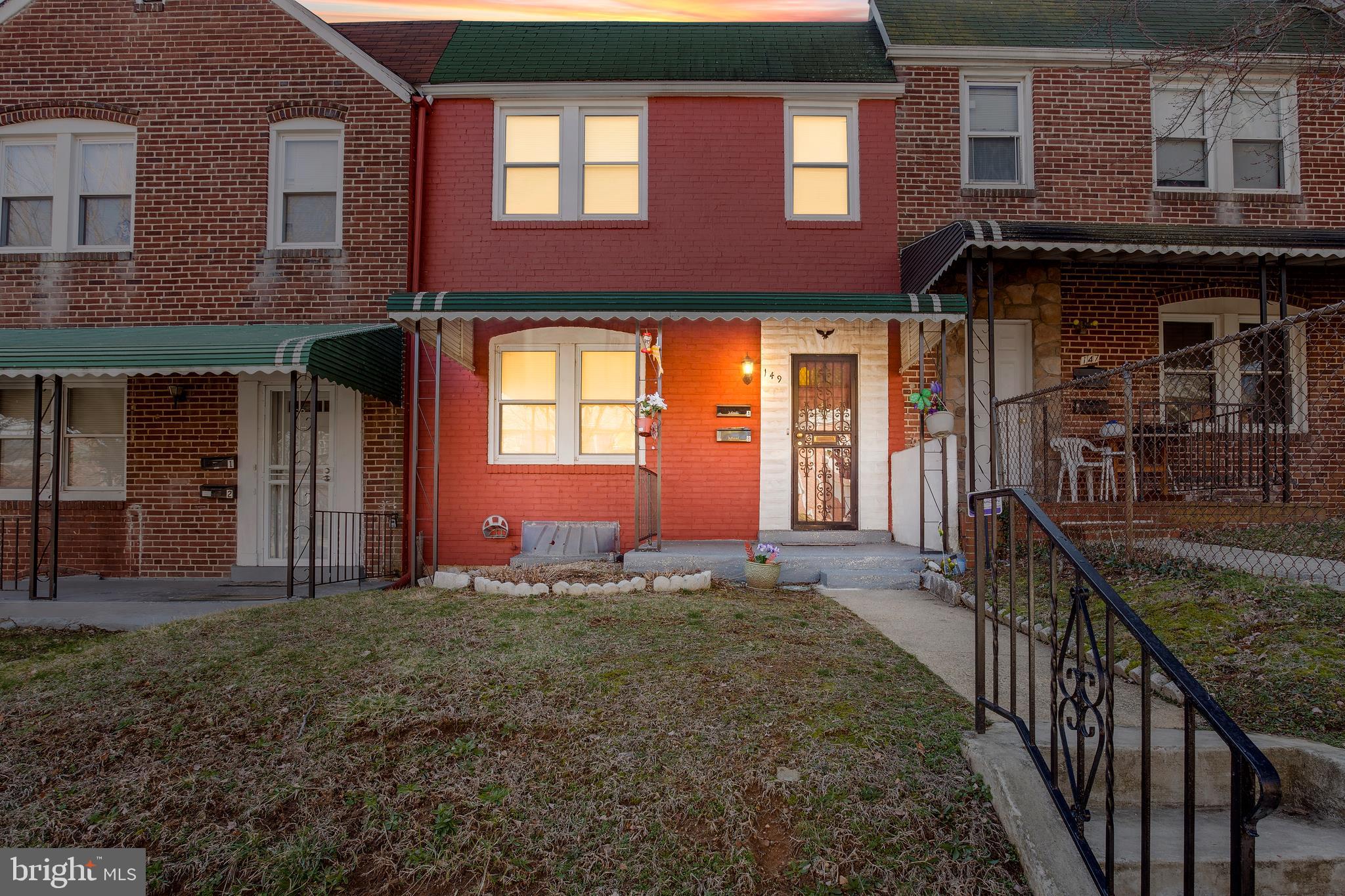 149 Denison Street, Unit 2 Baltimore, MD 21229 - Photo 1 of 19 a front view of a house