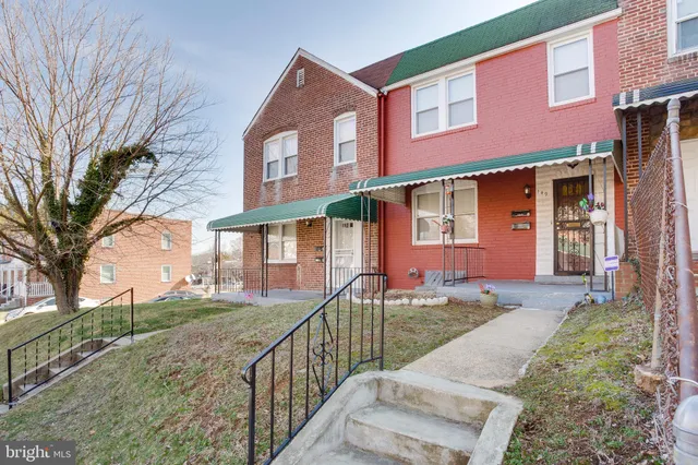 front view of house with a yard