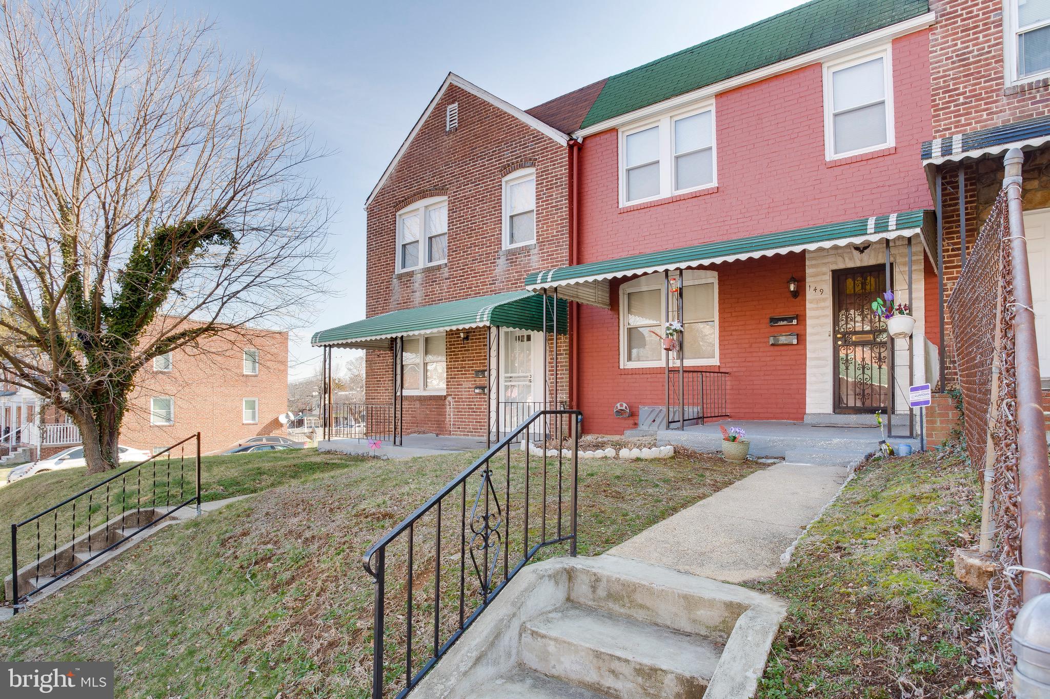 149 Denison Street, Unit 2 Baltimore, MD 21229 - Photo 19 of 19 front view of house with a yard