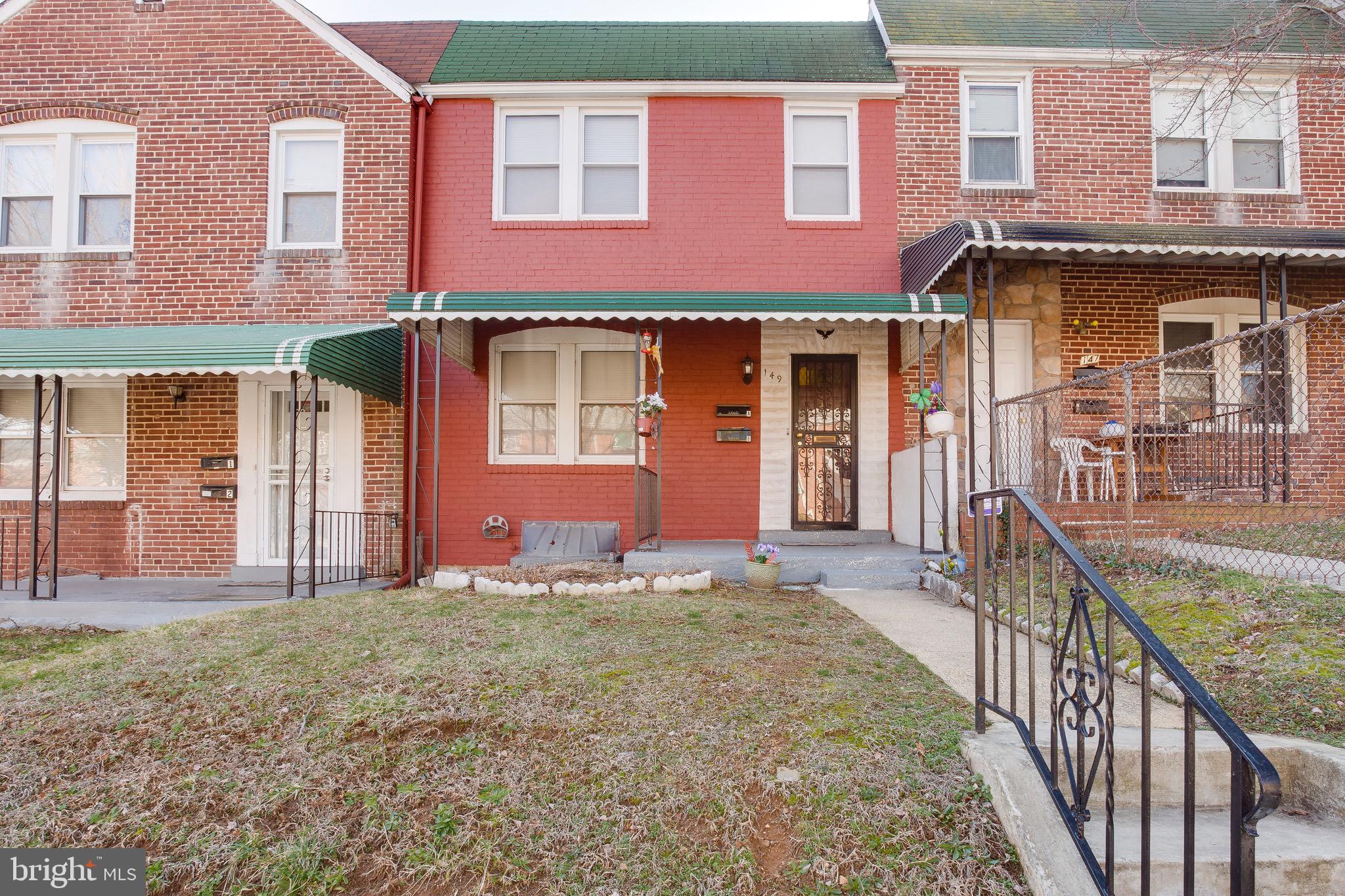 149 Denison Street, Unit 2 Baltimore, MD 21229 - Photo 2 of 19 a front view of a house