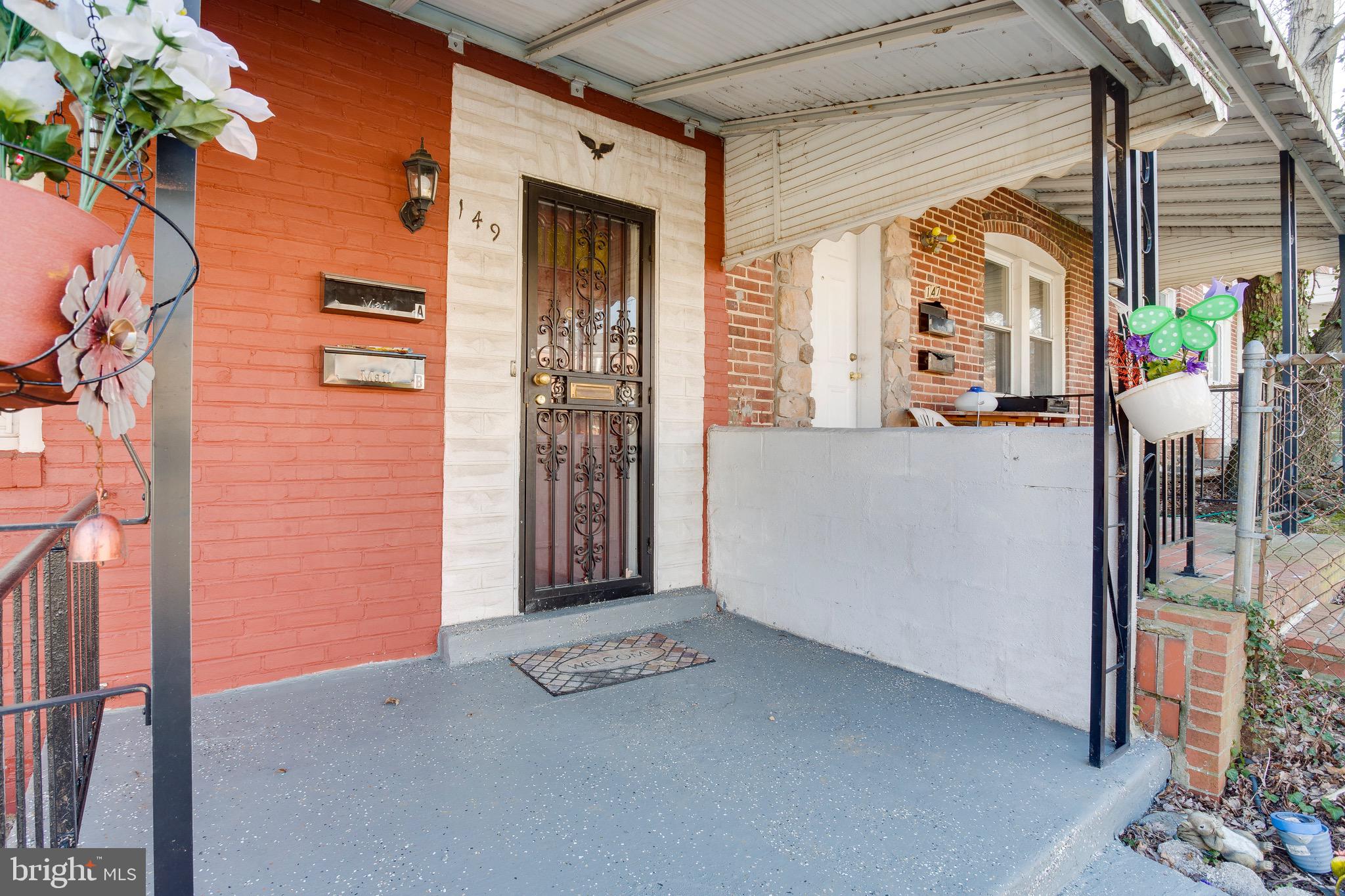 149 Denison Street, Unit 2 Baltimore, MD 21229 - Photo 3 of 19 a view of a door and outdoor space